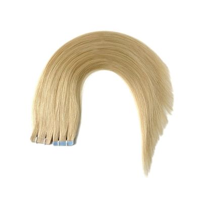 Le vrai ruban adhésif pour cheveux humains Remy dans les extensions capillaires pour une application sans tracas