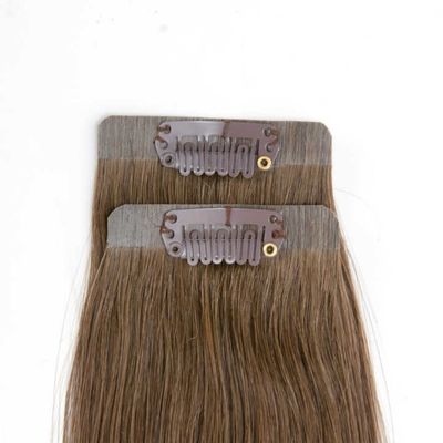 Des extensions de cheveux vietnamiennes sans couture avec des clips de style pré-liés et un tangle